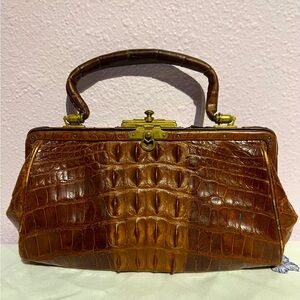 Brown alligator skin handbag with sliding solid brass top clasp
